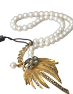 Collana con ciondolo albero in ottone dorato con perle di cristallo