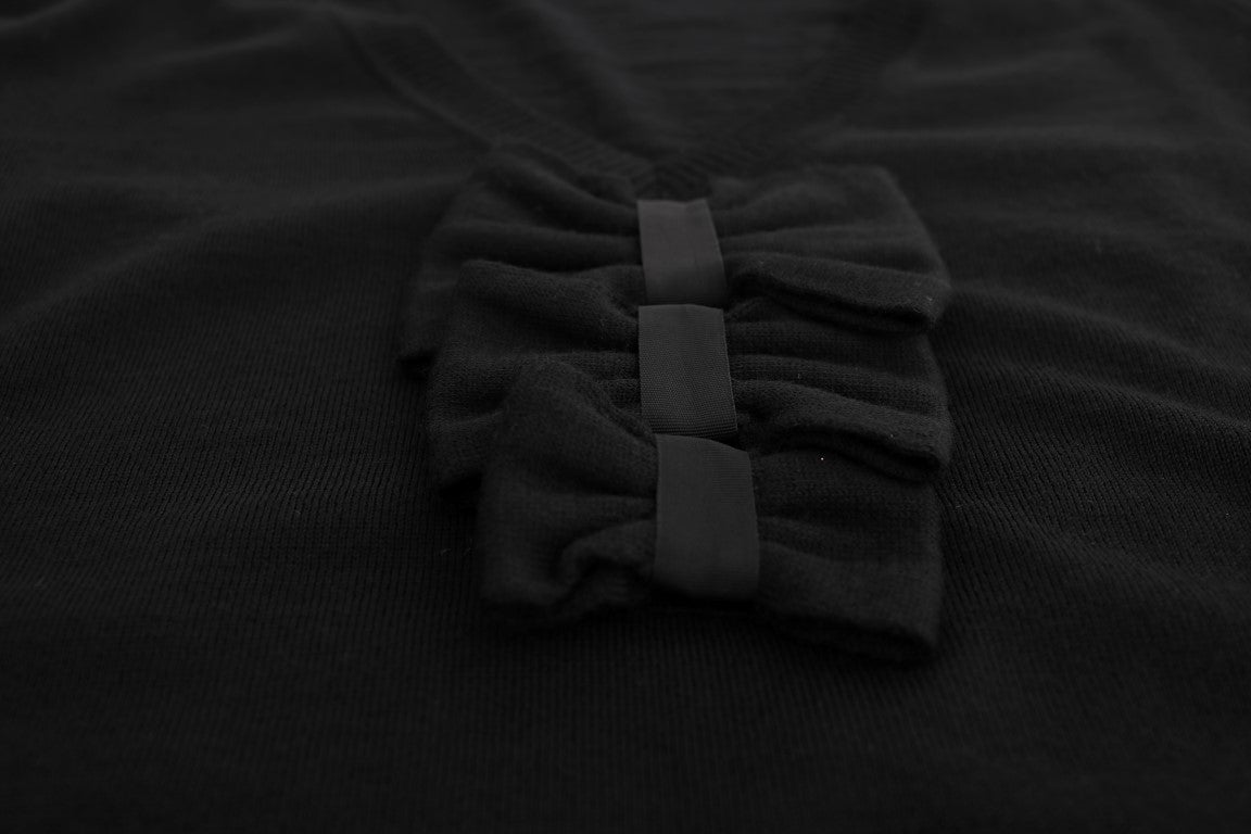 Schwarzes Wollkleid mit langen Ärmeln im Shift-Schnitt