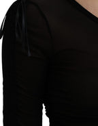 Schwarzes transparentes enges Etuikleid Midi