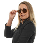Sonnenbrille aus goldfarbenem Metall und Kunststoff