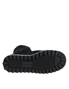 Schwarze gesteppte High-Top-Boots-Sneaker