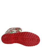 Rote kniehohe Gummistiefel mit Blumenmuster