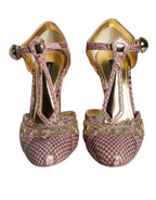 Sandals with T-strap and pump heel in pink gold leather