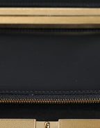 Clutch-Abendtasche mit mehrfarbigem Blumenmuster und Goldrahmen