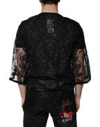 Schwarzes T-Shirt aus Nylon mit Blumenstickerei und Rundhalsausschnitt