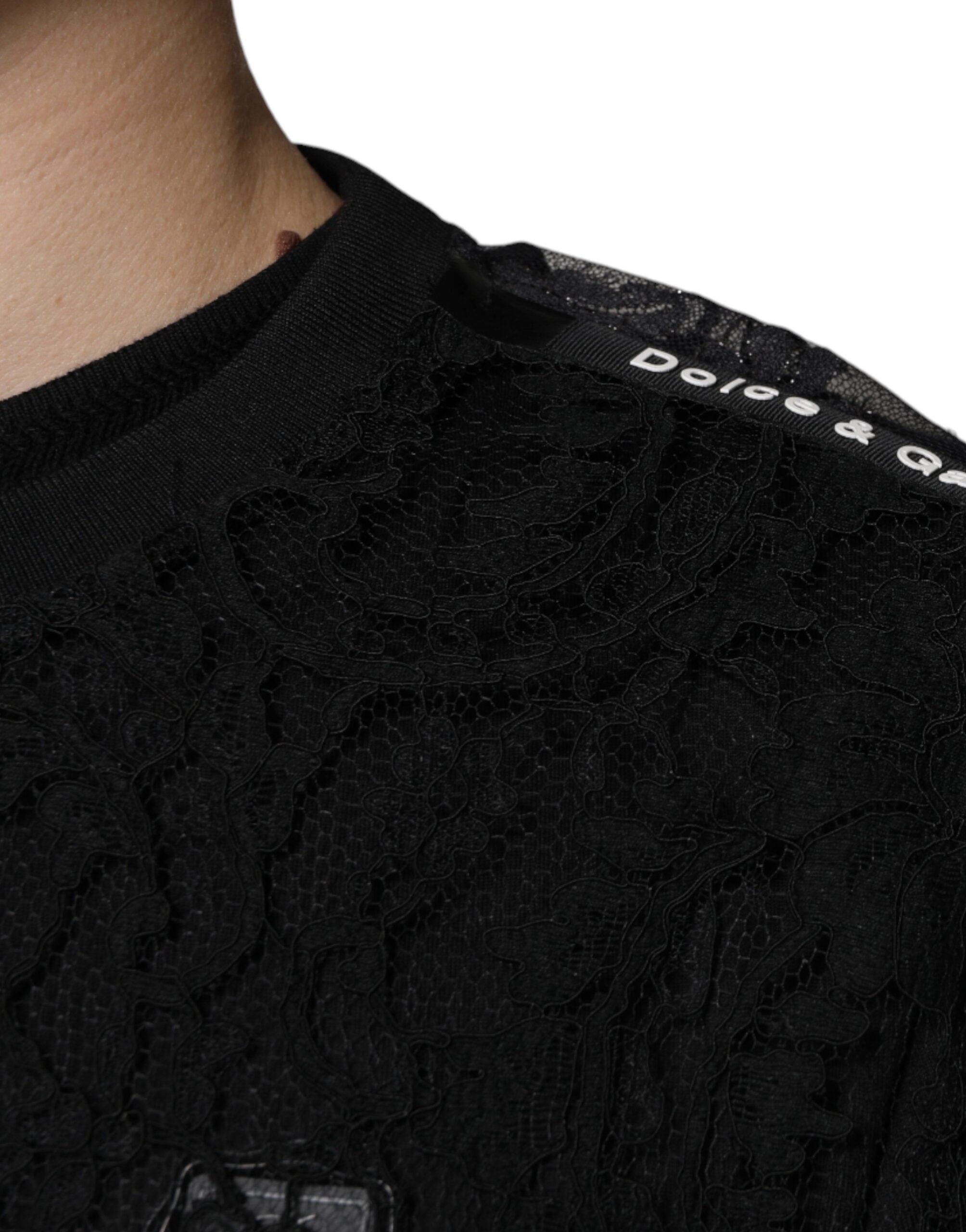 Schwarzes T-Shirt aus Nylon mit Blumenstickerei und Rundhalsausschnitt
