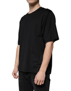 Schwarzes Baumwoll-T-Shirt mit Rundhalsausschnitt und kurzen Ärmeln