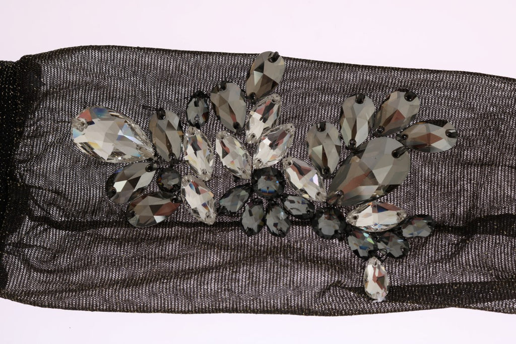 Schwarze elastische Socken mit Blumen und klaren Kristallen