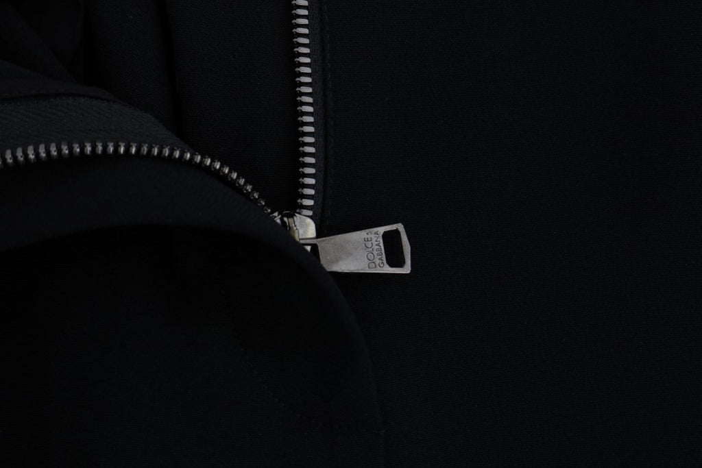 Schwarze Caprihose mit pinkfarbenen Streifen und Stretch-Anteil