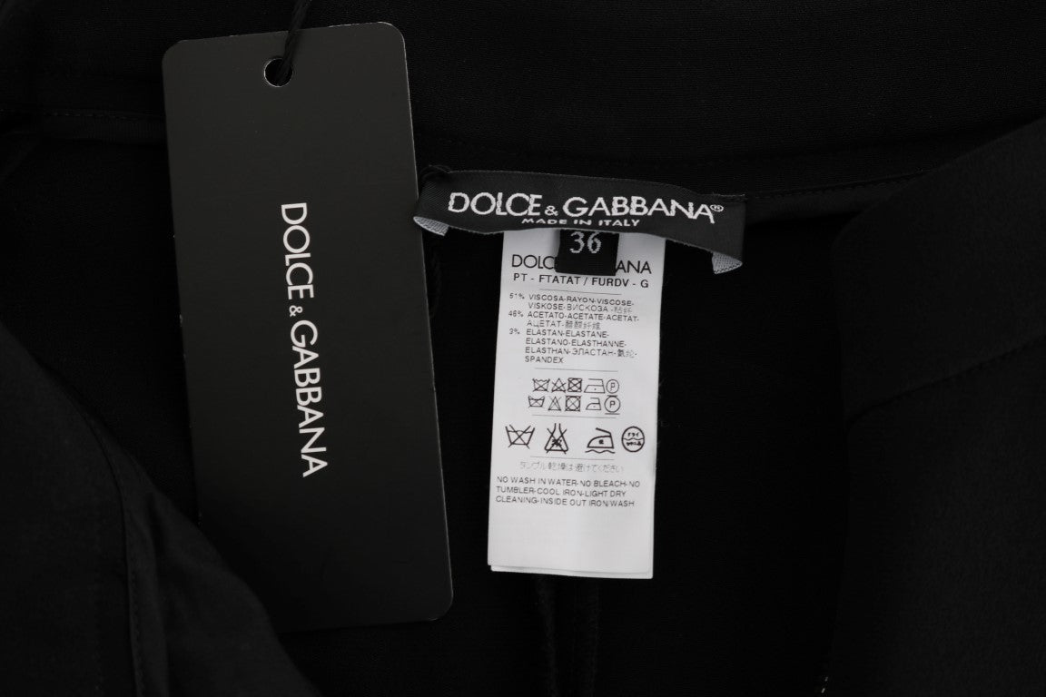 Schwarze Caprihose mit pinkfarbenen Streifen und Stretch-Anteil