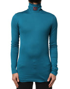 Blauer Baumwollrollkragenpullover mit langen Ärmeln