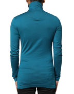 Blauer Baumwollrollkragenpullover mit langen Ärmeln
