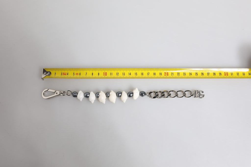 Armband mit Muschel-, DG-Logo- und Perlenanhänger aus silberfarbenem Messing