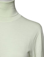 Hellgrüner Rollkragenpullover aus Wolle