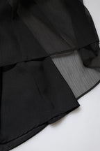 Schwarzes ärmelloses langes Ballkleid aus Tüll mit Perlen