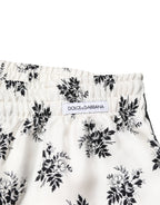 Weiße Freizeithose aus Seide mit Blumenmuster