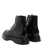 Stivaletti con logo in pelle nera con lacci