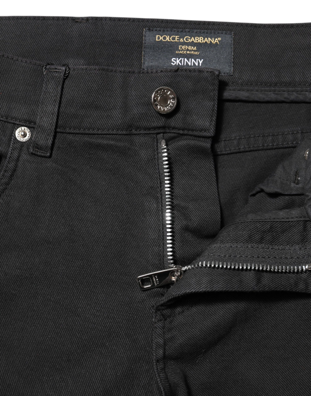 Jeans in denim neri skinny con fodera bianca strappata