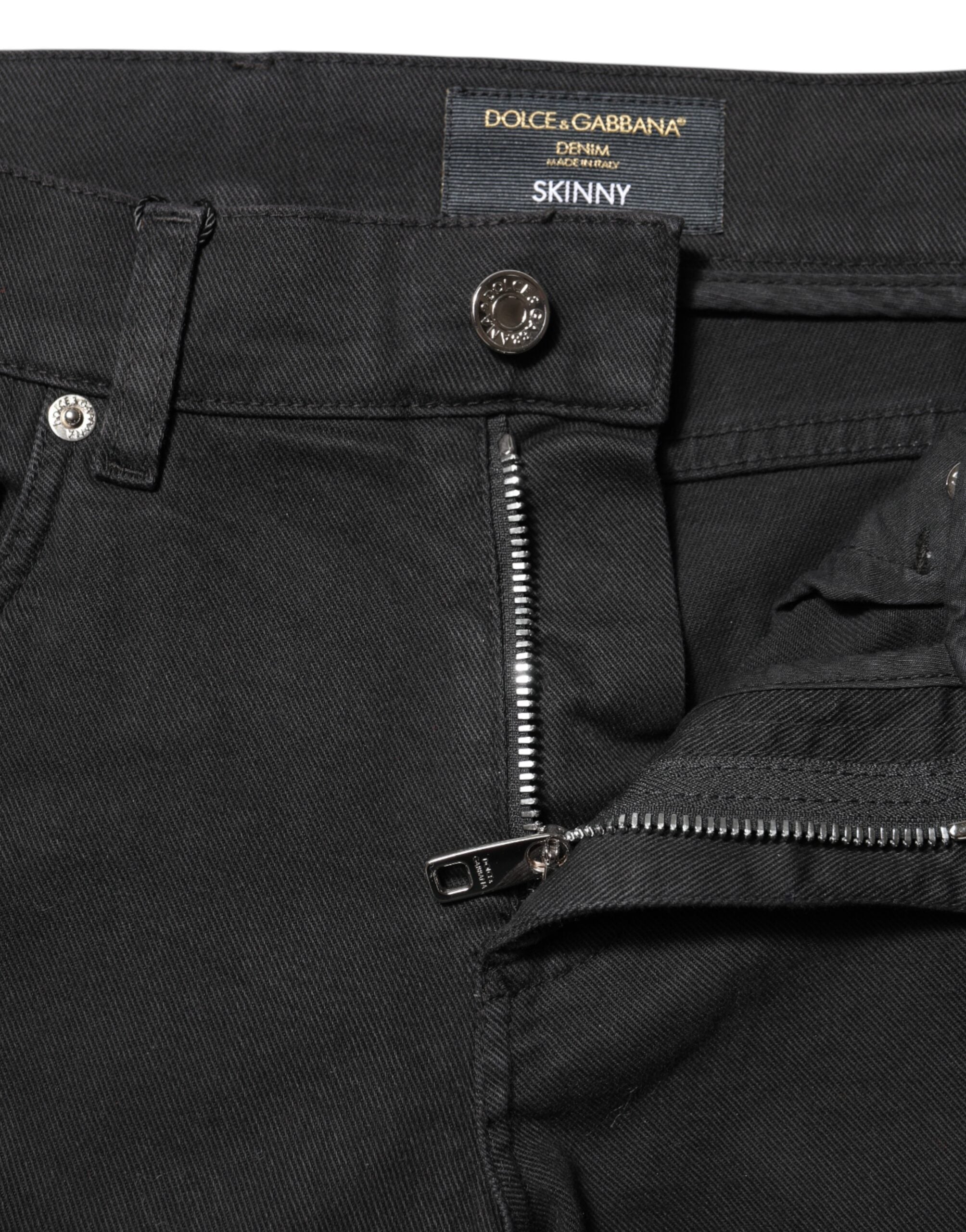 Jeans in denim neri skinny con fodera bianca strappata