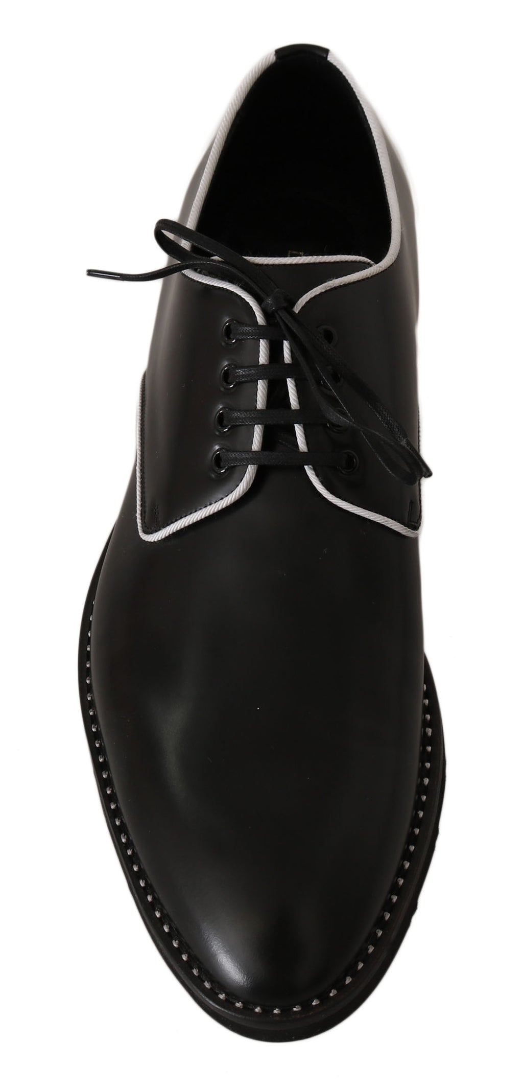 Schwarze Leder-Derbys mit weißer Linie