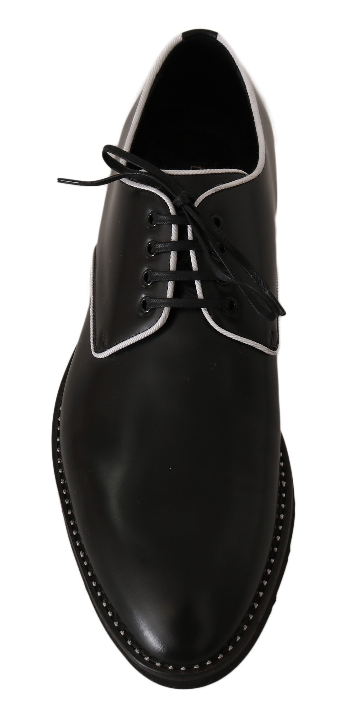 Schwarze Leder-Derbys mit weißer Linie