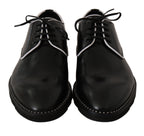 Schwarze Leder-Derbys mit weißer Linie