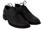 Schwarze Oxford Brogues aus Leder mit Flügelkappe