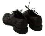 Schwarze Oxford Brogues aus Leder mit Flügelkappe