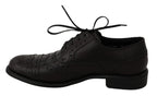 Schwarze Oxford Brogues aus Leder mit Flügelkappe