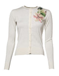 Cardigan sweater in white silk with lily embroidery