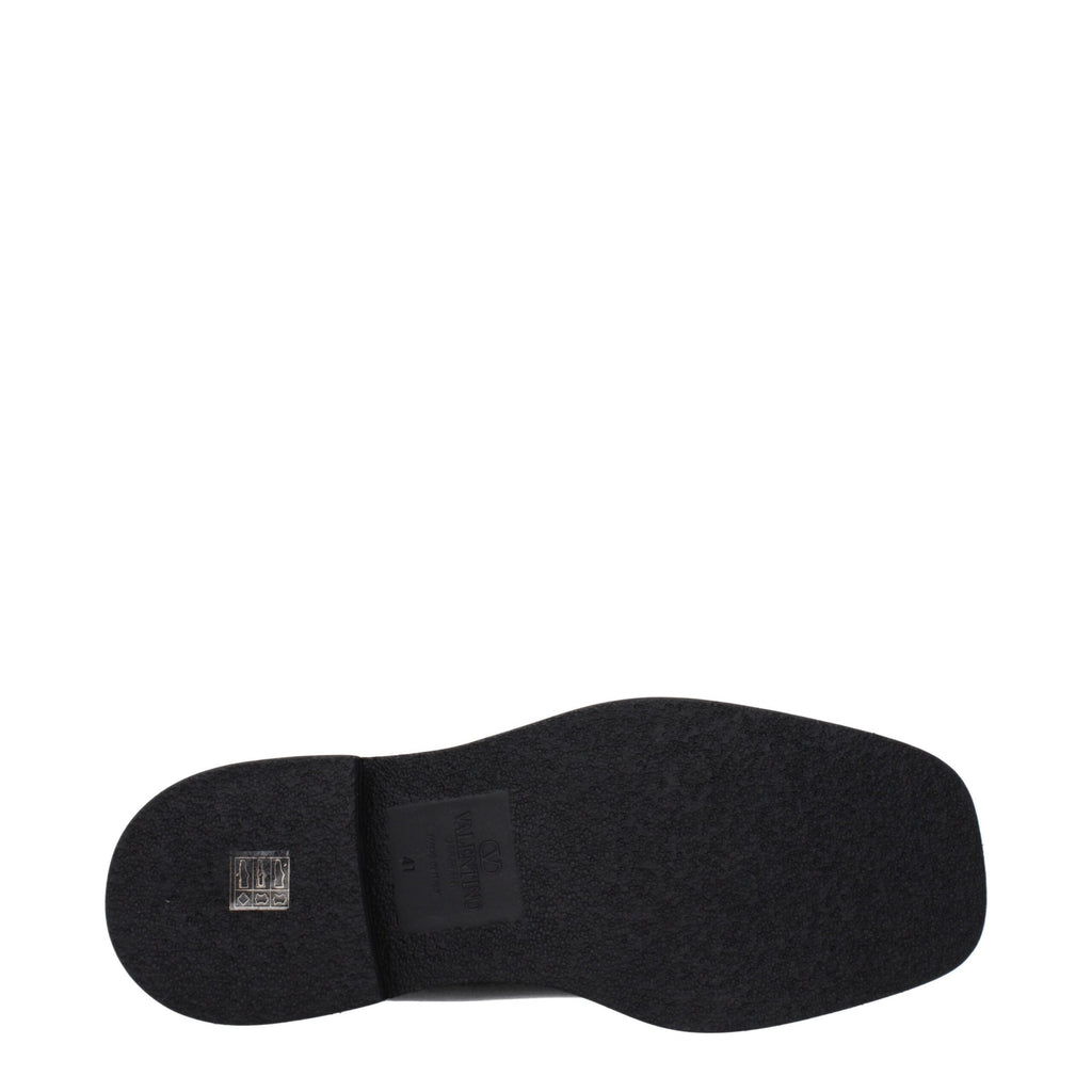 Schwarze Lederstiefeletten