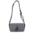 Schultertasche aus blauem Stoff