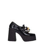 Schwarze Plateau-Slipper aus Leder