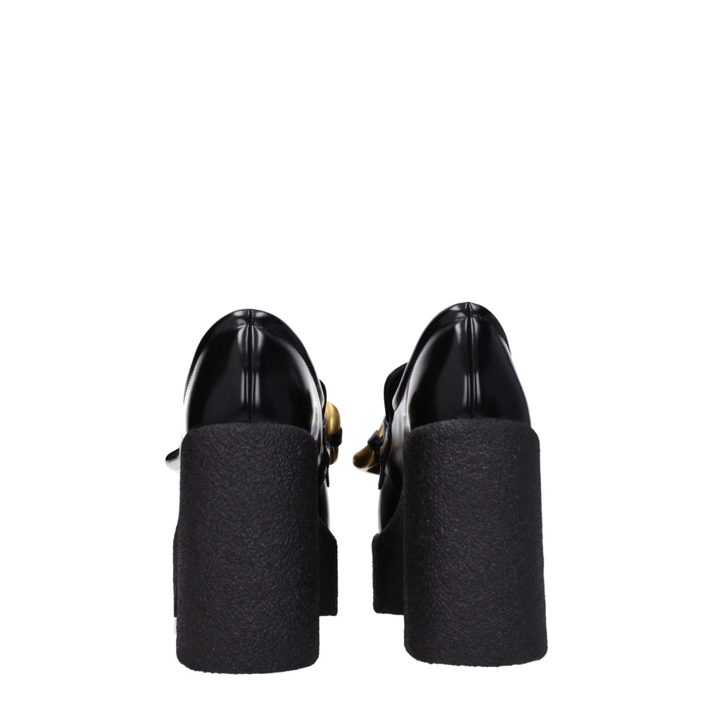 Schwarze Plateau-Slipper aus Leder
