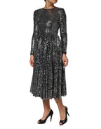 Schwarzes, knielanges A-Linien-Kleid mit langen Ärmeln und Pailletten