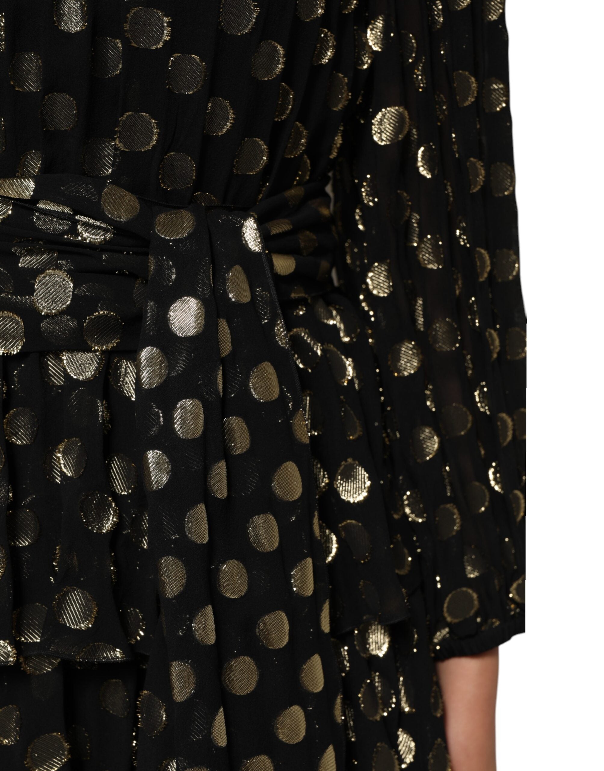 Minikleid aus schwarzem Seidenbrokat mit goldfarbenen Punkten