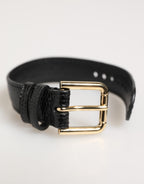 Armband mit schwarzem, geprägtem Leder und goldener Dornschließe