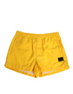 Gelbe Nylon Badeshorts mit Logo-Plakette
