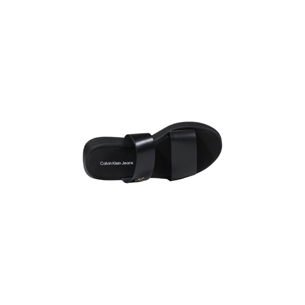 Schwarze flache Ledersandalen