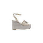 Beigefarbene High Heels aus Synthetik