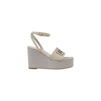 Beigefarbene High Heels aus Synthetik