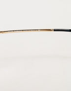 Occhiali da lettura con montatura cat-eye in acetato nero