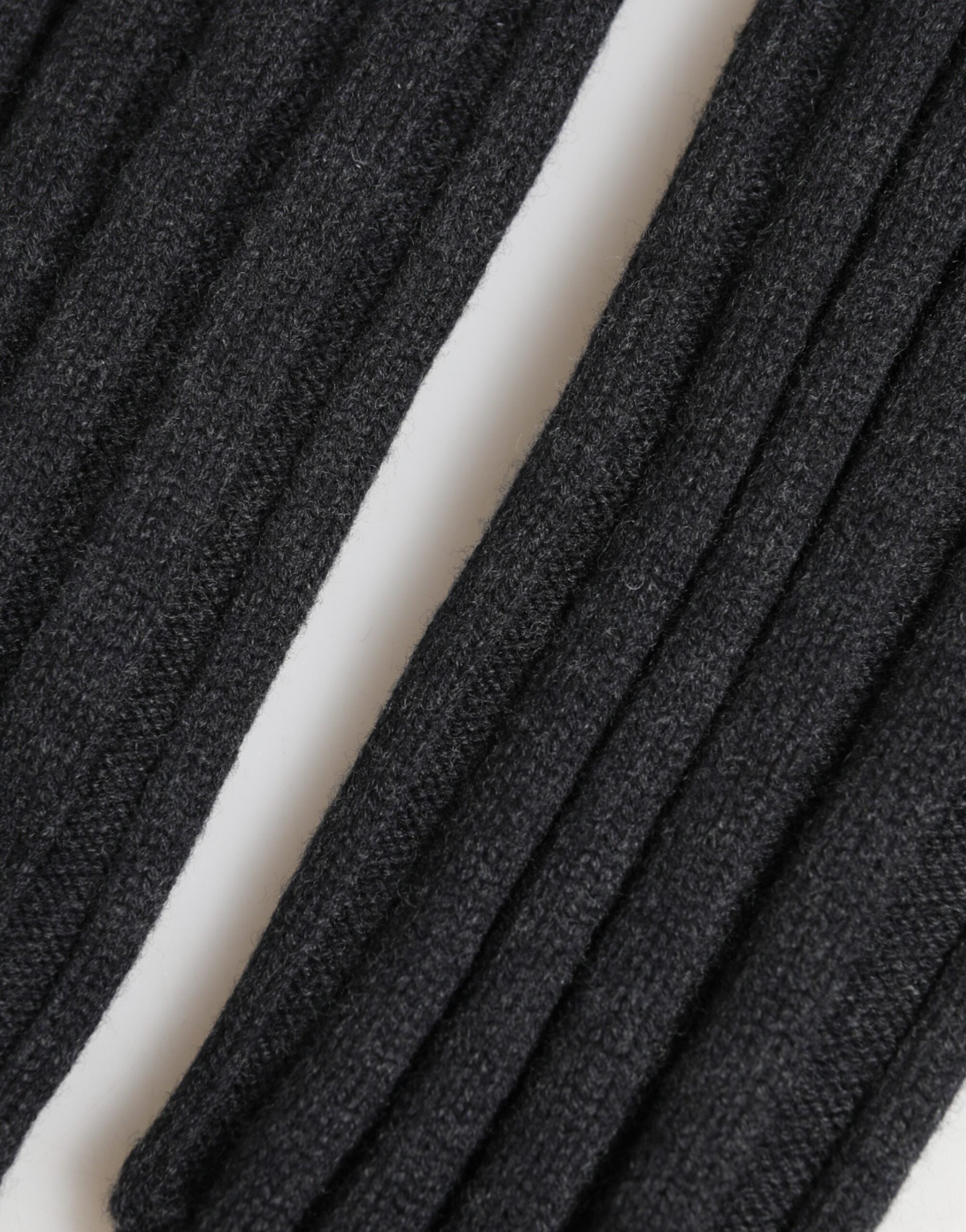 Schwarze fingerlose Handschuhe aus Merinowolle
