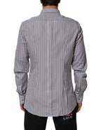 Camicia elegante da uomo a righe bianche e nere con dettagli dorati