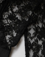 Schwarzes Midi-Bleistiftkleid aus Baumwolle mit Spitzeneinsätzen