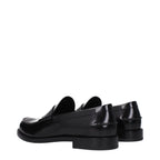 Slipper aus schwarzem Leder