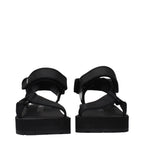 Schwarze flache Sandalen aus Stoff